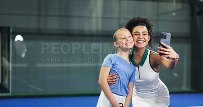 Buy stock photo Padel, selfie and smile of coach with girl in sports venue for memories, practice or training. Fitness, hug or photograph with child and personal trainer woman on space for development or exercise