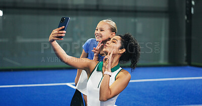 Buy stock photo Padel, peace sign and selfie of coach with girl in sports venue for memories, practice or training. Emoji, fitness or social media with child and personal trainer woman on space for profile picture