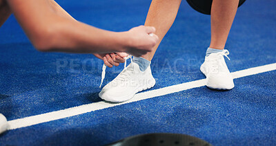 Buy stock photo Tennis, tie shoes and hands of person on court ready for practice, training and exercise for match. Sports, athlete and people help with sneakers for playing game, tournament and fitness competition