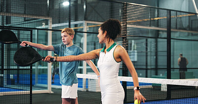 Buy stock photo Coach, child and woman with padel racket on court for learning sports, training and exercise. Personal trainer, fitness and person with children at practice for playing tennis, tournament and match