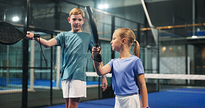 Buy stock photo Padel, learning and kids with racket on indoor court for sports workout, exercise and training. Fitness club, siblings and boy with girl for playing game, match and tournament for practice together