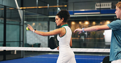 Buy stock photo Coach, padel and woman with child in lesson for learning sports skills, training or exercise. Serving, fitness and personal trainer with boy at practice with ball for playing game, tennis and match