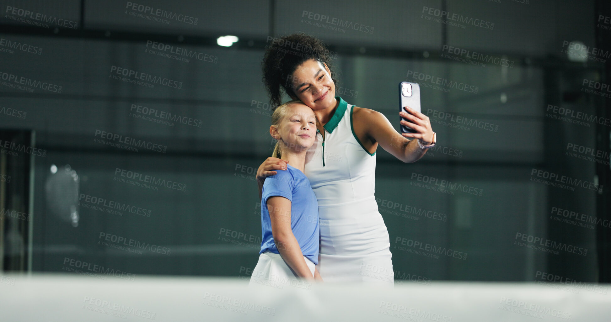 Buy stock photo Hug, padel and selfie of coach with girl in sports venue for memories, practice or training. Fitness, photograph and smile of child with personal trainer woman on space for development or exercise