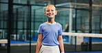 Tennis portrait, child and happy on court for match practice, game exercise and tournament workout. Padel, junior club and girl kid with smile at sports facility for about us, development or training