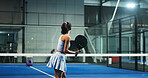 Padel tennis, athlete and woman with racket, court or practice for tournament, wellness or training. Healthy, person and workout routine for fitness, back and preparing for sport competition and game