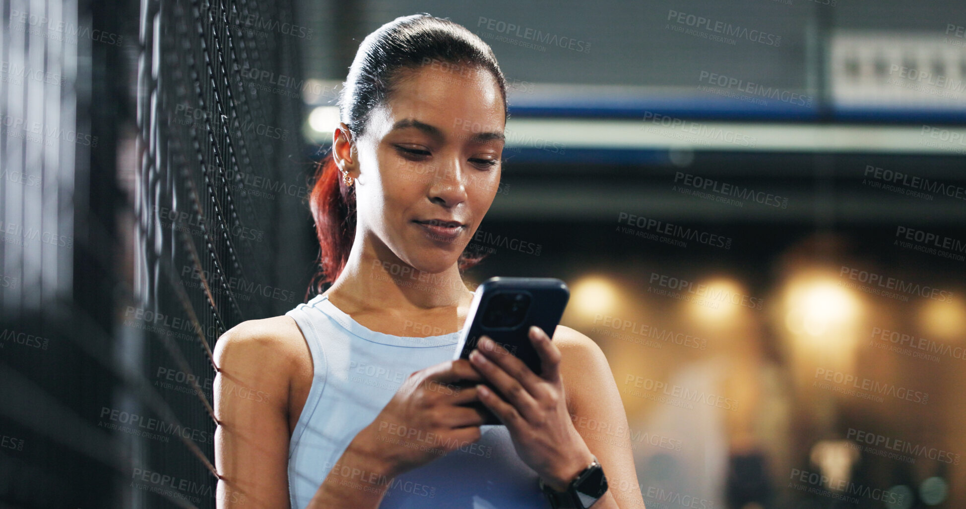 Buy stock photo Sport, woman and typing with phone at tennis court for texting, internet browsing and fitness break. Exercise, night and athlete with smartphone at padel club for reading notifications or mobile chat
