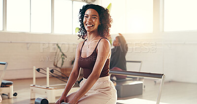 Buy stock photo Portrait, pilates reformer and woman in gym, excited and equipment for workout, wellness and health. Confident, smile and person on machine for core strength, exercise or balance in fitness center