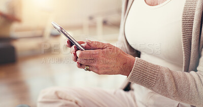 Buy stock photo Hands, smartphone and woman in studio, yoga and digital app for progress, communication and chatting. Closeup, cellphone and person with social media, online fitness and schedule with health class