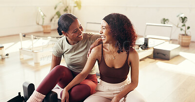 Buy stock photo Smile, women and friends for yoga class, fitness and support with motivation and wellness. Break, happiness and healthy people with reformer, pilates and humor for laughing and funny joke in club