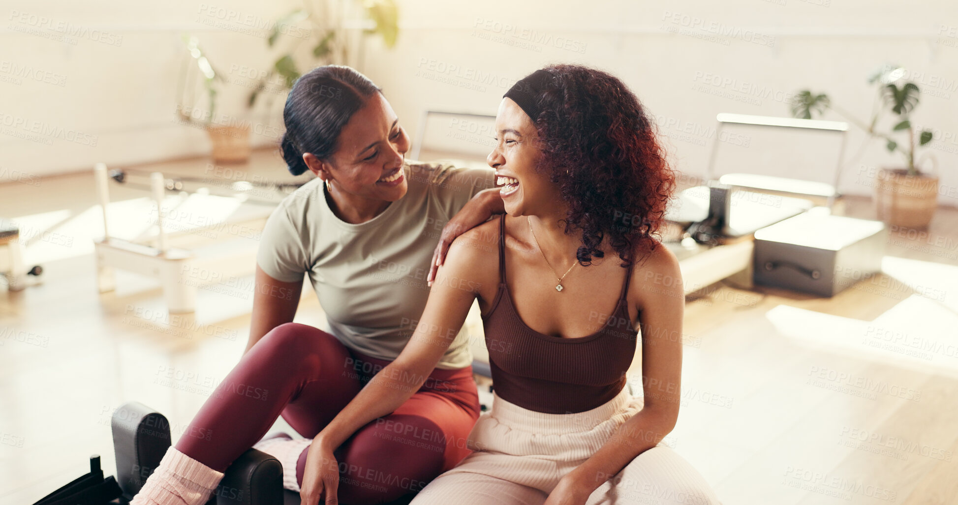 Buy stock photo Smile, women and friends for yoga class, fitness and support with motivation and wellness. Break, happiness and healthy people with reformer, pilates and humor for laughing and funny joke in club