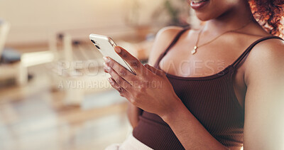 Buy stock photo Woman, hands and fitness with phone for social media, workout schedule or sport app in gym. Closeup, female person or typing with mobile smartphone for online chatting, texting or exercise routine