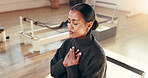 Yoga, meditation and breathing with woman, relax and calm with wellness, zen and stress relief. Heart health, fitness and person in studio, workout and gratitude with balance, peaceful and chakra