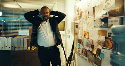 Buy stock photo Black man, detective and stress with evidence board for investigation, crime scene and clue mapping. Police, bulletin and urgent case with night, new Information and forensic review of deadline