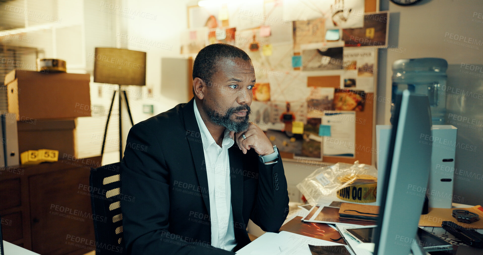 Buy stock photo Man, computer and detective thinking with research for case, search for lead or crime analysis. Mature black person, criminal investigation and check surveillance online or problem solving at night