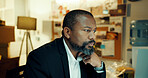 Thinking, black man and detective in office with report for research on case with problem solving. Tech, night and male private investigator with surveillance, justice and evidence investigation