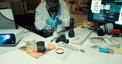 Buy stock photo Man, forensics and dust knife for fingerprints, brush and light with tools for evidence at lab. African person, firearm and murder weapon with inspection, police exam or search for criminal identity