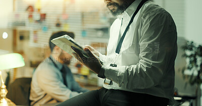 Buy stock photo Hands, police detective and man with tablet for investigation, case report or leads at night. Tech, officer and review evidence for crime, clues or problem solving for justice in office on overtime