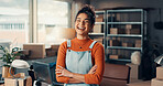 Portrait, crossed arms and woman in office with logistics, shipping or delivery for small business. Laugh, confident and female entrepreneur from Brazil with pride for distribution of order packages.