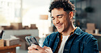 Smile, cellphone and man in office with boxes for confirmation with online order, ecommerce or contact. Happy, technology and male entrepreneur with phone for shipping details on package in workplace