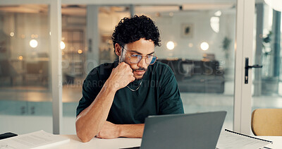 Buy stock photo Laptop, thinking and web coding with man in office at night for problem solving or solution. Business, design and computer with programmer in workplace for evening maintenance or troubleshooting