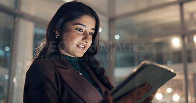 Buy stock photo Business woman, night and tablet for research, policy review or insurance in office. Technology, happy broker and online in workplace for reading email with claims, update and bokeh on overtime