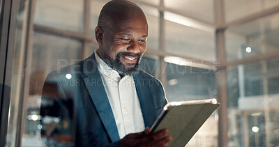 Buy stock photo Business, tablet and happy black man in workplace for insurance or policy review at night. Technology, mature broker and online in office for reading email with claims, update or bokeh on overtime
