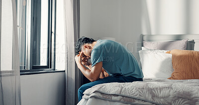 Buy stock photo Frustrated, man and stress on bed at house with insomnia, sleeping disorder and depression. Tired, male person and mourning loss with mental health crisis, loneliness and emotional burnout in bedroom
