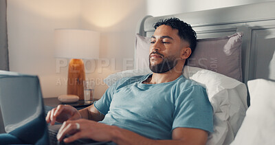 Buy stock photo Digital, typing and man with laptop, bedroom or proofreading fiction story, website and remote work. Freelance, ghostwriter and person with tech for novel, creative and editing ebook on bed in house