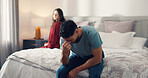 Frustrated man, bed and mistake with regret for cheating affair, fight or confrontation in home. Upset, male person or disappointed with guilt in separation for bedroom dispute, conflict or divorce