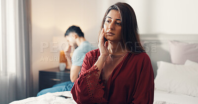 Buy stock photo Woman, thinking or bed with regret for divorce, toxic relationship or domestic violence in home. Upset, female person or man with bedroom dispute for separation, conflict or confrontation in house