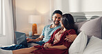 Couple, laugh and relax in bed with laptop, streaming media and favorite series in home. Happy man, woman and tech in bedroom with love, digital subscription and watching comedy movie with connection