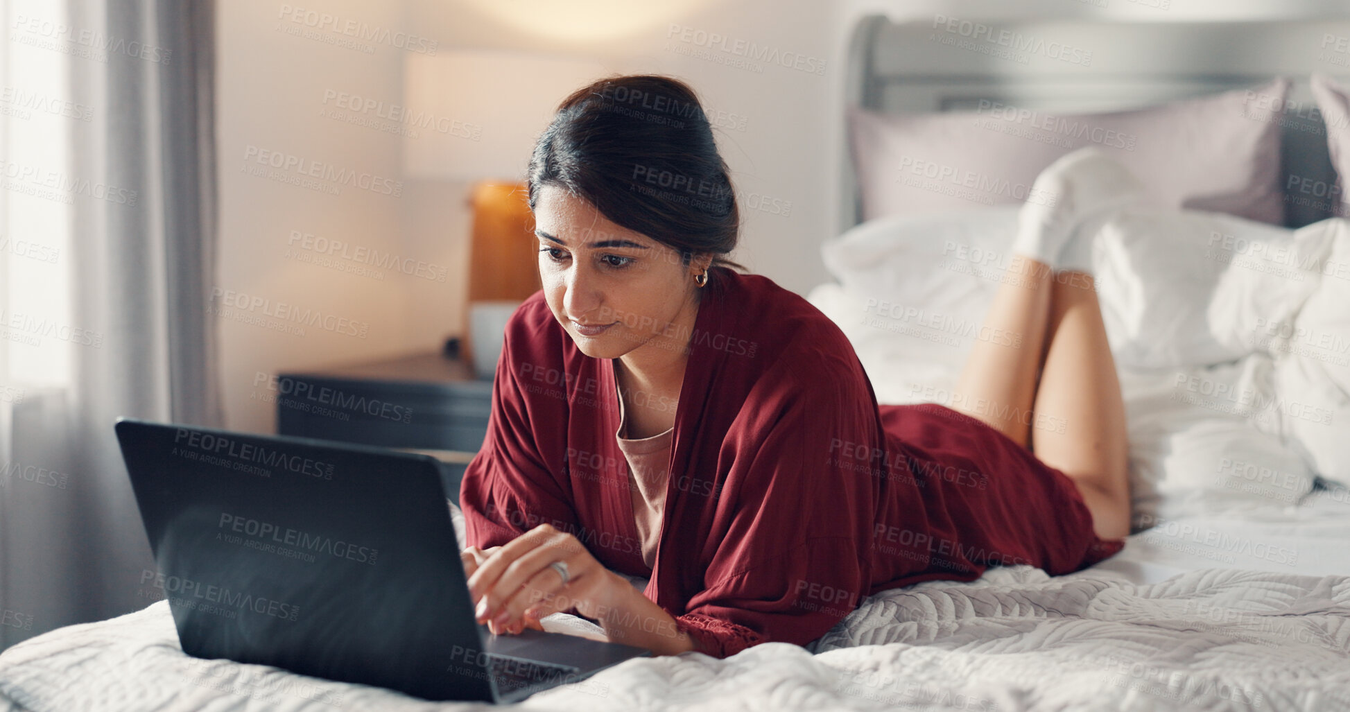 Buy stock photo Woman, typing and person with laptop, bedroom and creative for freelance email marketing on website. Online, copywriter and employee with tech for project, remote work and editing article in house