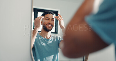 Buy stock photo Mirror, cream and man in bathroom, skincare and smile with morning routine, shine and beauty. Home, reflection and person with creme, lotion and healthy skin with dermatology, cosmetics and glow