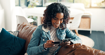 Buy stock photo Credit card, phone and smile with woman on sofa for online shopping, ecommerce and sales discount. Digital payment, banking app and customer or person in living room of home for fintech and purchase