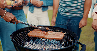Buy stock photo Hands, person and BBQ sausage on grill of meal prep, grilled food and cooking for social gathering. Friends, tong and barbecue meat on heat for lunch, cookout event and party reunion in house outdoor