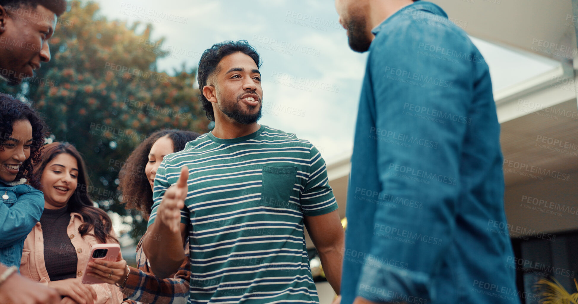 Buy stock photo Friends, backyard and people at party talking for bonding, relaxing and fun conversation on weekend. Happy, outdoor and men with women hangout in garden for celebration, social gathering and reunion