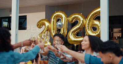 Buy stock photo New Year, celebration and people at party, cheers or friends together for reunion or festive season. House, gathering and group with alcohol to welcome 2026, toast and balloon decoration on holiday