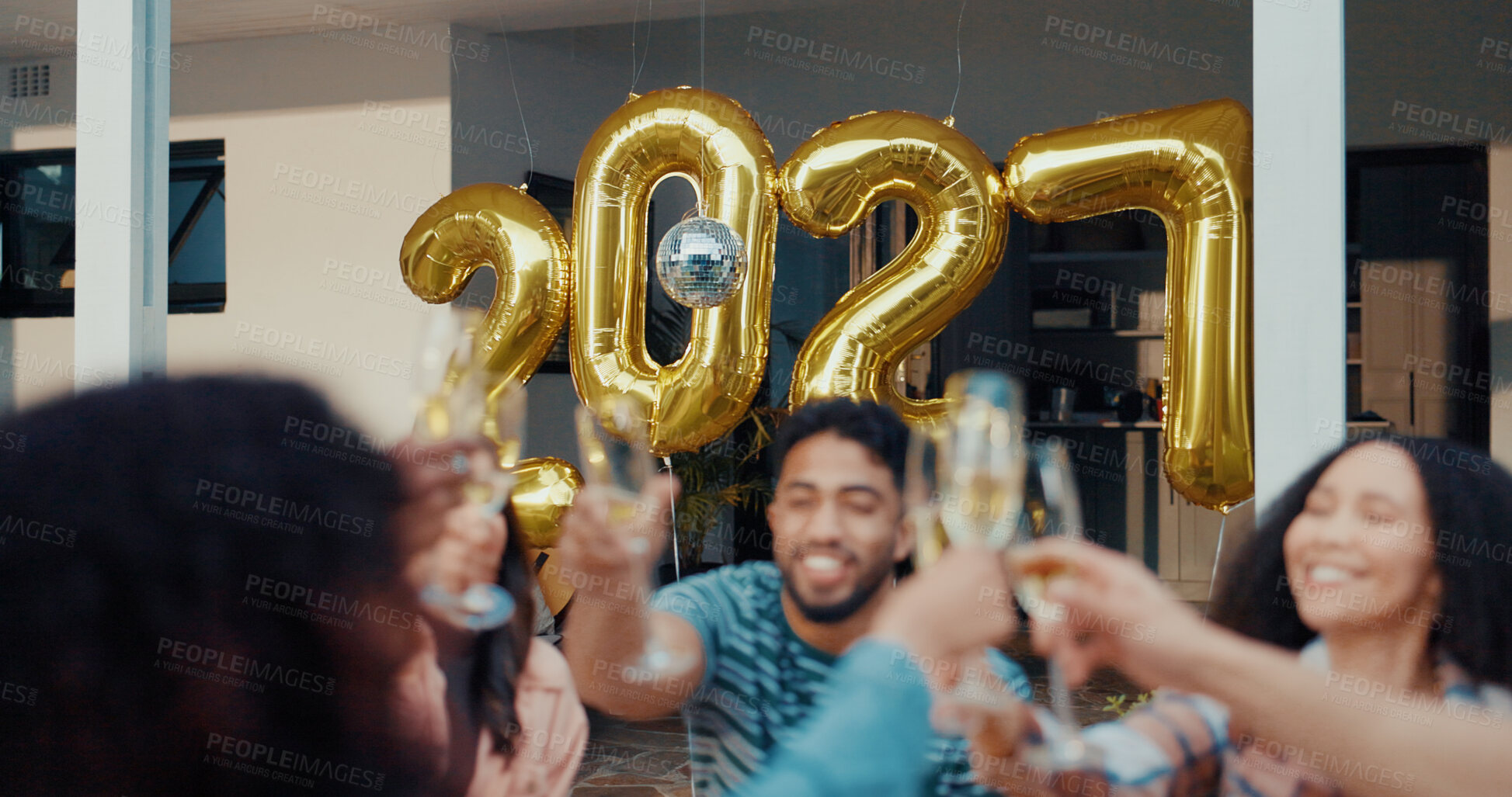 Buy stock photo New Year, reunion and people at party, cheers or friends together for celebration or festive season. House, gathering and group with alcohol to welcome 2027, toast and balloon decoration on holiday