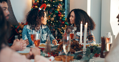 Buy stock photo People, friends and talk with food for Christmas holiday with festive lunch, celebration and tradition. Women, chat and dining table for social gathering, buffet reunion and bonding together at house