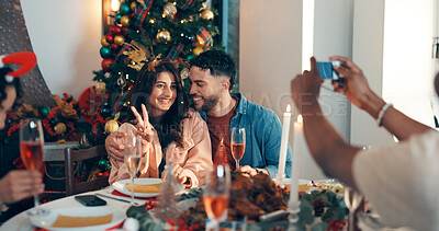 Buy stock photo Peace sign, couple of friends with photo for christmas celebration, festive reunion and social media post. Holiday, people and photography for bonding with xmas, profile picture and memory at house