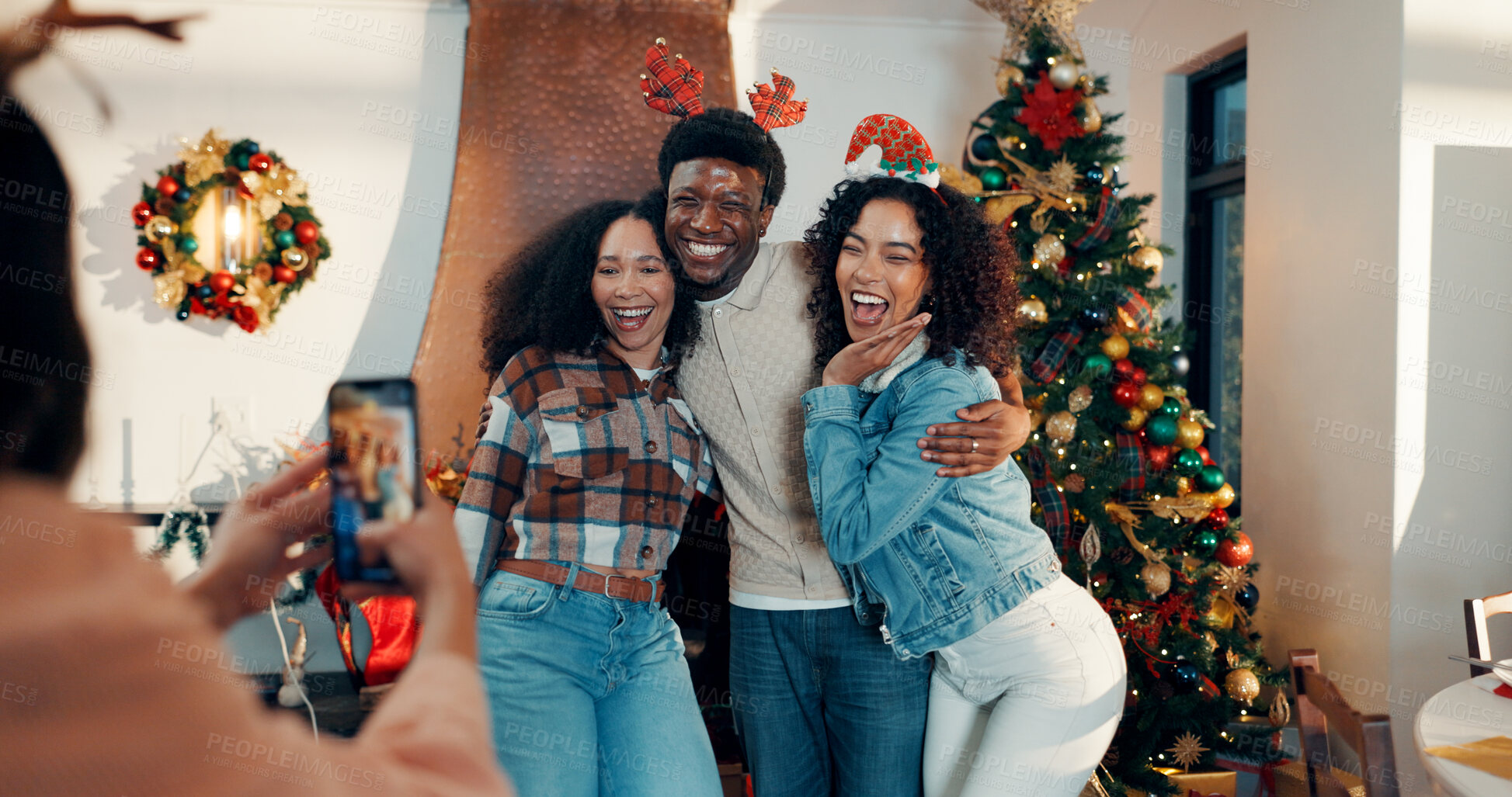 Buy stock photo Smile, group and friends with photography for Christmas celebration, festive reunion and social media post. Excited, people and holiday hug for bonding with xmas, profile picture and memory at house