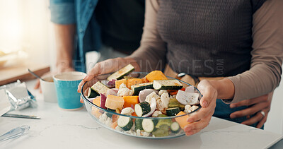 Buy stock photo Woman, hands or bowl with vegetables in kitchen for meal prep, salad or healthy food at home. Closeup, female person or couple with vegetarian recipe or ingredients for natural organic snack in house