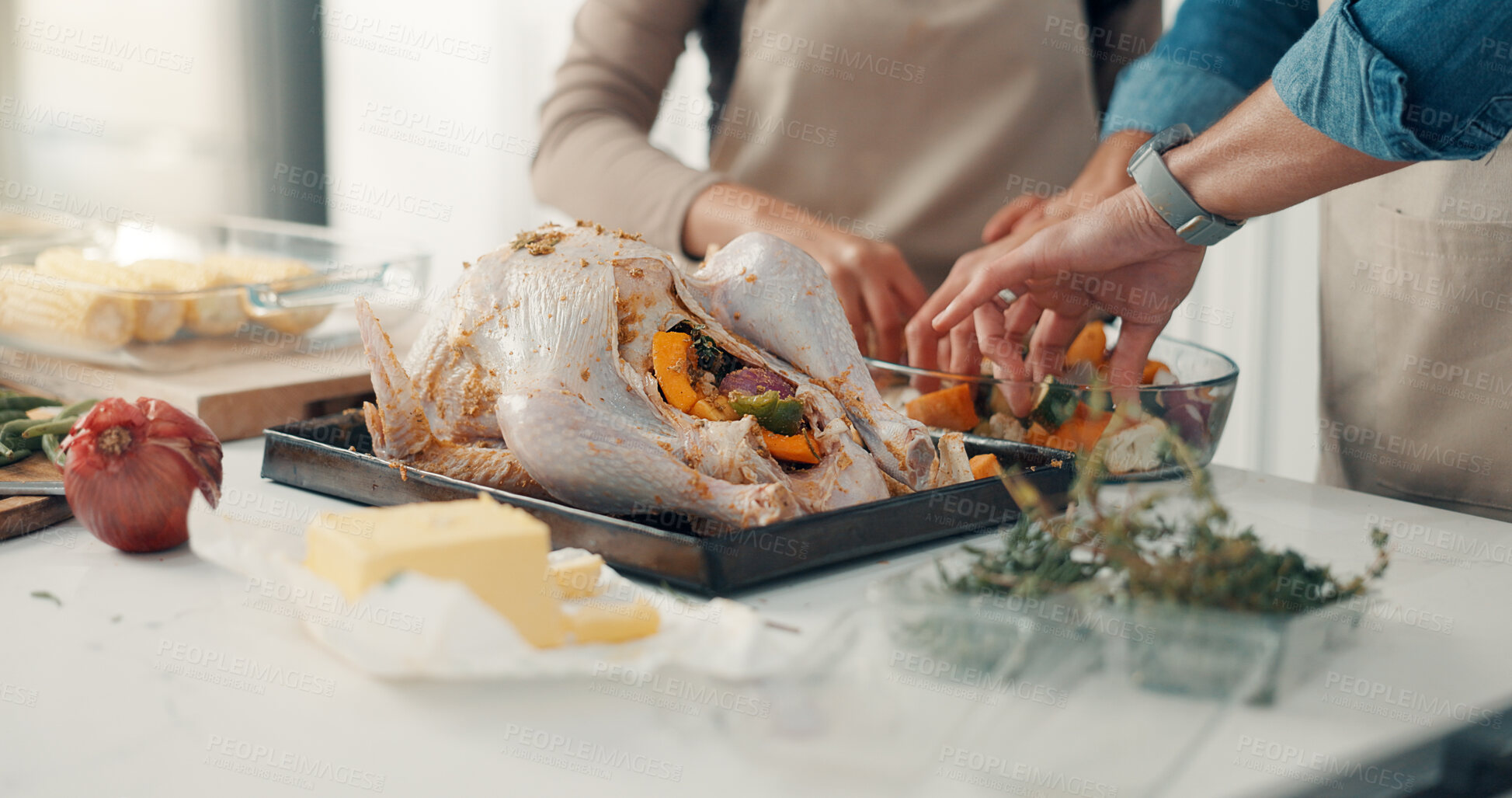 Buy stock photo Cooking, hands or people in kitchen with turkey for meal prep, supper or festive lunch. Thanksgiving, stuffing and man with woman, ingredients and recipe or meat for nutrition, dish or dinner in home