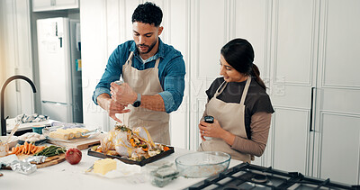 Buy stock photo Cooking, smile and couple in kitchen with turkey for meal prep, supper and festive lunch. Thanksgiving, food and man with woman with ingredients, recipe and meat for nutrition, dish or dinner party
