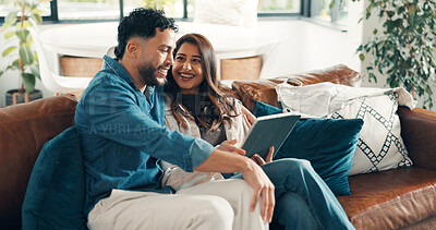 Buy stock photo Happy, couple and relax with tablet at house for social media, reading funny meme and bonding. Smile, people and digital for streaming film, comedy movie and entertainment subscription in living room