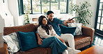 Happy couple, relax or watching tv with remote on sofa for online streaming or subscription in home. Man, woman and channel on couch for movie app, entertainment platform or show together in house