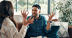 Couple, living room and dispute with anxiety, stress and drama in home or apartment. Frustrated, woman and man with argument, angry and fight with toxic marriage and mistake or crisis with partner
