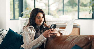 Buy stock photo Woman, relax and reading with phone for sofa, scroll social media and notification in home. Cellphone, connection and search website for download, digital app or mobile ebook and smile in living room