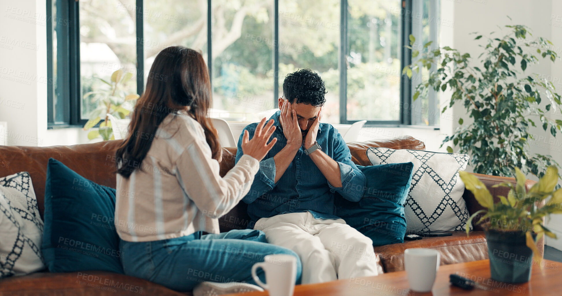Buy stock photo Couple, living room and argument with anxiety, stress and drama in home or apartment. Frustrated, woman and man with dispute, angry and fight with toxic marriage and mistake or crisis with partner