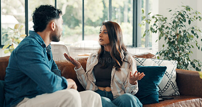 Buy stock photo Couple, living room and argument with mistake, stress and drama in home or apartment. Frustrated, woman and man with dispute, angry and fight with toxic marriage and anxiety or crisis with partner